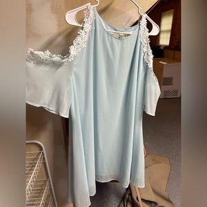 New with tags, light blue dress with open shoulder sleeve.